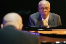 FILE - In this Oct. 9, 2008 file photo, Cuban pianist Bebo Valdes, right, and his son Chucho Valdes perform during a joint concert at the Casa de America in Madrid, Spain. Bebo Valdes died Friday, March 22, 2013 in Sweden, according to the Society of Spanish Authors without specifying the cause of death. He was 94. (AP Photo/Paul White, File)