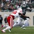 Michigan State's Le'Veon Bell (24) rushes against Nebraska's Eric Martin during the first quarter of an NCAA college football game, Saturday, Nov. 3, 2012, in East Lansing, Mich. (AP Photo/Al Goldis)