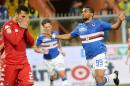 Sampdoria's Samuel Eto'o, right, celebrates after scoring during a Serie A soccer match between Sampdoria and Cagliari at the Luigi Ferraris stadium in Genoa, Italy, Saturday, March 7, 2015. Eto'o scored his first goal since returning to Italy as Sampdoria beat Cagliari 2-0 in Serie A on Saturday to stay in the hunt for a spot in Europe. (AP Photo/Luca Zennaro)