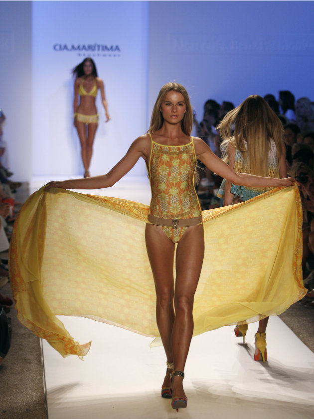 A model wears swimwear from the collection of  Cia. Maritima during the Mercedes-Benz Fashion Week Swim 2013 show, Saturday, July 21, 2012, in Miami Beach, Fla. (AP Photo/Lynne Sladky)