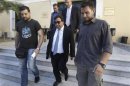 Greek shipowner Restis leaves a court in Athens