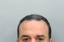 This file photo provided by the Miami Dade Corrections and Rehabilitation Department shows Alberto Morales. Morales who escaped in Texas after stabbing a detective with his eyeglasses was fatally shot early Saturday, Feb. 16, 2013 after refusing to cooperate with officers and lunging at them, police said in Grapevine, Texas (AP Photo/Miami Dade Corrections and Rehabilitation Department )
