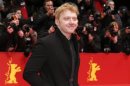Actor Grint poses on red carpet as he arrives for the screening of the film "The Necessary Death of Charlie Countryman" at the 63rd Berlinale International Film Festival in Berlin