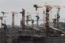 Idle cranes are seen at the construction site of the Panama Canal Expansion project on the outskirts of Colon City