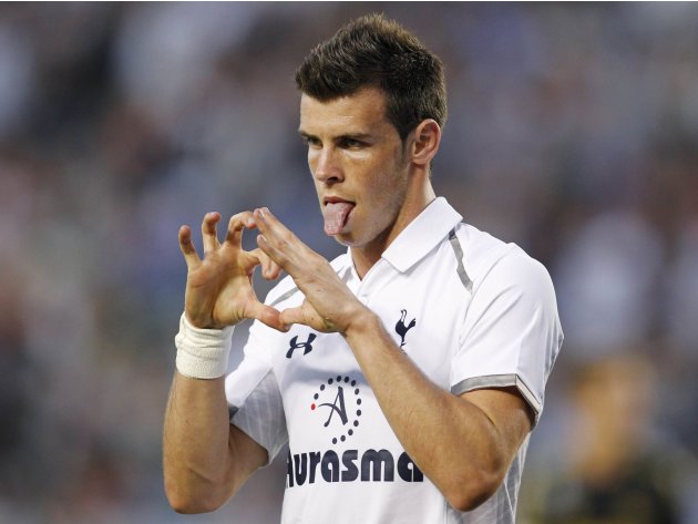 Tottenham Hotspur&#39;s Gareth Bale gestures a heart shape after scoring against the Los Angeles Galaxy during the first half of an international friendly soccer match in Carson, California