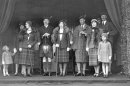 FILE - In this Sept. 8 1932 file photo, Britain's Princess Elizabeth, later Queen Elizabeth II, front right, stands with her mother and father, Duke and Duchess of York , fourth and fifth from right, at the Braemar Highland Gathering. Starting Saturday, June 2, 2012, Queen Elizabeth II begins a four-day celebration of her 60 years on the throne. (AP Photo, File)