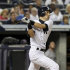 New York Yankees' Ichiro Suzuki looks after his solo home run during the fourth inning of the baseball game against the Boston Red Sox Sunday, Aug. 19, 2012 at Yankee Stadium in New York.  (AP Photo/Seth Wenig)