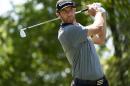 Dustin Johnson tees off on the ninth hole during the final round of the Houston Open golf tournament, Sunday, April 3, 2016, in Humble, Texas. (AP Photo/Eric Christian Smith)