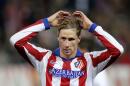 Atletico's Fernando Torres reacts during a King's Cup soccer match between Atletico de Madrid and Real Madrid at the Vicente Calderon stadium in Madrid, Spain, Wednesday, Jan. 7, 2015 . (AP Photo/Daniel Ochoa de Olza)