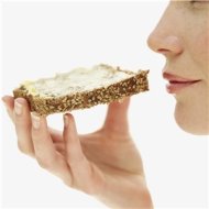 woman eating bread