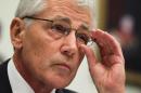 US Secretary of Defense Chuck Hagel listens during a hearing before the House Armed Services Committee June 11, 2014 in Washington
