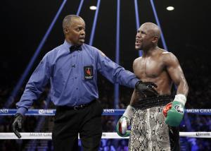 FILE - In this Sept. 13, 2014, file photo, Floyd Mayweather&nbsp;&hellip;