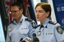 New South Wales Police Commissioner Catherine Burn and Australian Federal Police Deputy Commissioner Michael Phelan address the media after two 16-year-old boys were charged with terror-related offences in Sydney on October 13, 2016