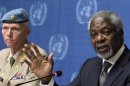 Joint Special Envoy of the UN and the Arab League for Syria Annan gestures next to Major-General Mood, head of the UN Supervision Mission in Syria during a news conference in Geneva