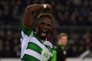 Celtic's French striker Moussa Dembele celebrates scoring the equalizer from the penalty spot against Borussia Moenchengladbach on November 1, 2016