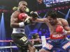 Bradley Jr. of the U.S. exchanges blows with WBO welterweight champion Pacquiao of the Philippines during their title fight at the MGM Grand Garden Arena in Las Vegas