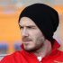 David Beckham of Paris Saint-Germain sits on the substitute bench before his team's French Ligue 1 soccer match against FC Lorient, western France