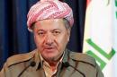 Barzani attends a news conference in Arbil