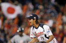 FILE - In this March 22, 2009 file photo, Japan relief pitcher Yu Darvish reacts after striking out United States' Adam Dunn for the final out in a World Baseball Classic game at Dodger Stadium in Los Angeles. For Yu Darvish and the Texas Rangers, it's deadline day. The AL champion Rangers are at the end of their 30-day negotiating window to agree to a contract with Japan's top pitcher that they bid a record $51.7 million just to talk to. (AP Photo/Mark J. Terrill, File)