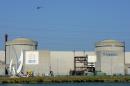 A helicopter flies over the Tricastin Areva nuclear power plant in the French southeastern town of Pierrelatte, southern France, on July 15, 2013