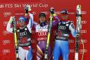 From left, second-place finisher Beat Feuz, of Switzerland, first-place finisher Kjetil Jansrud, of Norway, and third-place finisher Steven Nyman, of the United States, celebrate on the podium after the men's World Cup downhill ski race, Friday, Dec. 5, 2014, in Beaver Creek, Colo. (AP Photo/Alessandro Trovati)