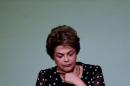 Suspended Brazilian President Dilma Rousseff gestures during the launching ceremony of the book "Resistance to the 2016 Coup," written by professors from the University of Brasilia, in Brasilia