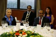US Secretary of State Hillary Clinton (L) and Singapore's Minister for Foreign Affairs and Law K. Shanmugam attend a dinner at the Ministry of Foreign Affairs in Singapore, on November 16. Clinton arrived in Singapore for consultations with the city-state's leaders, ahead of an Asia-Pacific summit in Cambodia with President Barack Obama