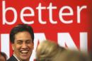 Leader of Britain's opposition Labour party Ed Miliband laughs at an election rally in Glasgow