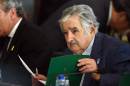 Leftist President Jose Mujica's party is facing a tight race to hold onto power in the October 26 vote
