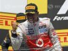 McLaren Formula One driver Hamilton celebrates his victory during the podium ceremony following the Canadian F1 Grand Prix at the Circuit Gilles Villeneuve in Montreal