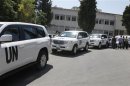 U.N. vehicles, carrying United Nations chemical weapons experts, arrive at Yousef al-Azma military hospital in Damascus