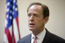 FILE - In this May 9, 2016, file photo, Sen. Pat Toomey, R-Pa., speaks during a news conference in Philadelphia. Republicans aren't just distancing themselves from Donald Trump, they're making a point of not campaigning with him. When Trump was in Pennsylvania last week, Toomey was nowhere to be found. Same with Chuck Grassley in Iowa. (AP Photo/Matt Rourke, File)