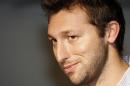 FILE - In this April 1, 2007, file photo, Ian Thorpe, of Australia, a five-time Olympic swimming gold medalist, listens to a reporter's questions during a press conference in Melbourne, Australia. Australian media report that Thorpe will reveal he is gay in a television interview with English talk show host Michael Parkinson, to be broadcast in Australia on Sunday, July 13, 2014. (AP Photo/Rob Griffith, File)
