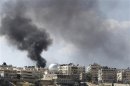 Smoke rises after a Syrian Air Force fighter jet launched missiles at El Edaa district in Aleppo