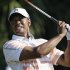Tiger Woods hits from the 12th tee during the second round of the Cadillac Championship golf tournament Friday, March 8, 2013, in Doral, Fla. (AP Photo/Tiger Woods)