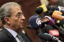 Amr Moussa, chairman of the committee to amend Egypt's constitution speaks at a news conference at the Shura Council in Cairo