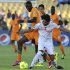 Ivory Coast's Traore challenges Tunisia's Bilel during their African Nations Cup Group D soccer match in Rustenburg