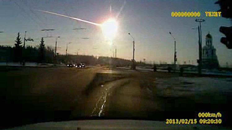 In this frame grab made from dashboard camera vide shows a meteor streaking through the sky over Chelyabinsk, about 930 miles east of Moscow, Friday, Feb. 15, 2013. After a surprise meteor hit Earth at 42,000 mph and exploded over a Russian city in February, smashing windows and causing minor injuries, scientists studying the aftermath say the threat of space rocks hurtling toward our planet is bigger than they had thought. Meteors like the one that exploded over Chelyabinsk _ and those that are even bigger and more dangerous _ are probably four to five times more likely to hit Earth than scientists thought before the February mid-air explosion, according to three studies released Wednesday in the journals Nature and Science. (AP Photo/AP Video)