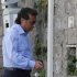 Francesco Schettino, the former captain of Costa Concordia, leaves his home in Meta Di Sorrento, near Naples, Sunday, Oct. 14, 2012. The first hearing of the trial for the Jan. 13 tragedy, where 32 people died after the luxury cruise Costa Concordia was forced to evacuate some 4,200 passengers as it hit a rock while passing too close to the Giglio Island, is taking place in Grosseto Monday. Captain Francesco Schettino, who was blamed for both the accident and for leaving the ship before the passengers, is scheduled to attend the hearing. (AP Photo/Salvatore Laporta)