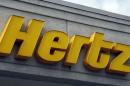 A Hertz sign is seen outside a rental car office in Ferndale in this file photo