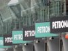 Petronas advertising boards are seen near the grandstand ahead of the Malaysian F1 Grand Prix at the Sepang circuit outside Kuala Lumpur