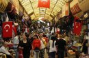 People shop in a shopping district in Hatay