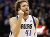 Dallas Mavericks forward Dirk Nowitzki (41) celebrates scoring two points during the second half of an NBA basketball game against the Los Angeles Clippers, Tuesday, March 26, 2013, in Dallas. Dallas won 109-102 in overtime. (AP Photo/Brandon Wade)