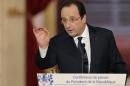 French President Hollande answers a question during a news conference at the Elysee Palace in Paris