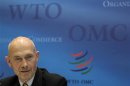 WTO Director General Lamy addresses a news conference on annual trade forecast and statistics in Geneva