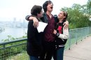 This image released by Summit Entertainment shows, from left, Logan Lerman, Ezra Miller and Emma Watson in a scene from 
