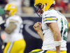 Green Bay Packers quarterback Aaron Rodgers (12) celebrates a touchdown against the Houston Texans in the fourth quarter of an NFL football game, Sunday, Oct. 14, 2012, in Houston. (AP Photo/Dave Einsel)