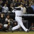 Yankees' Ibanez hits a solo home run in front of Orioles' Wieters during Game 3 of their MLB ALDS baseball playoff series in New York