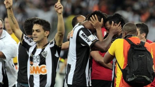 Josue, Jo and Ronaldinho (L-R) of Brazil's Atletico Mineiro celebrate after winning their Copa Libertadores second leg against Paraguay's Olimpia (Reuters)