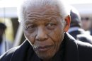 FILE - In this June 17, 2010 file photo, former South African President Nelson Mandela leaves the chapel after attending the funeral of his great-granddaughter Zenani Mandela in Johannesburg, South Africa. The South African presidency says Nelson Mandela was re-admitted to hospital with a recurrence of a lung infection Thursday March 28, 2013. (AP Photo/Siphiwe Sibeko, Pool, File)
